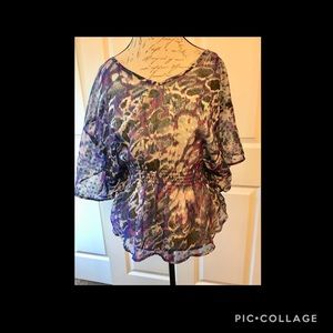 Sheer, flirty blouse